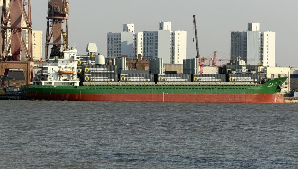 Chinese cargo ship carrying containerized modular missile launchers, highlighting the dual-use potential of commercial shipping vessels