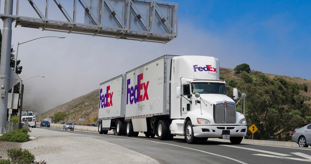 FedEx Freight truck leaving a service center after the company's 2026 spinoff as an independent LTL carrier.